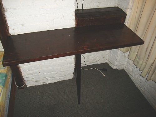 The old desk next to our bed.