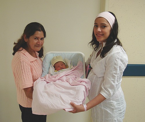 Esme and her mother holding Alice.