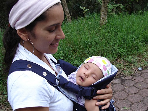 Esme carrying baby Alice.