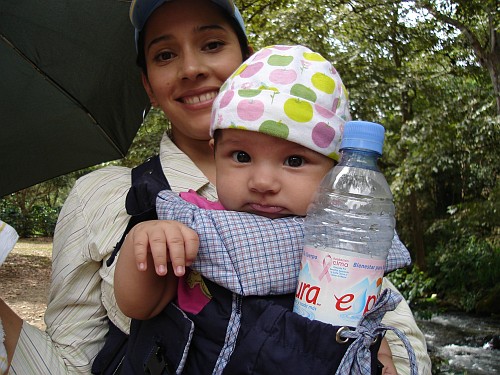 Esme carrying baby Alice.