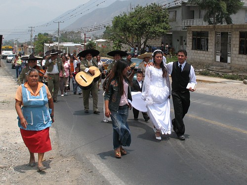 The wedding reception as part of Mexican wedding traditions is filled with