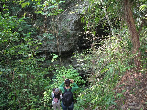 Rocio taking a photo of the cave's entrance.