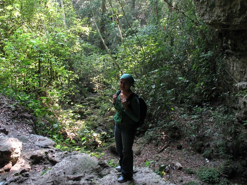Rocio standing near the cave entrance.