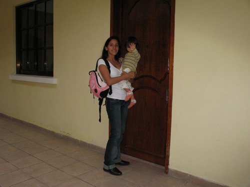 Esme holding Alice in front of our room in hotel Monroy.