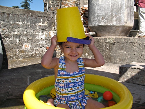 Alice Bokma wearing a yellow plastic bucket on her head.