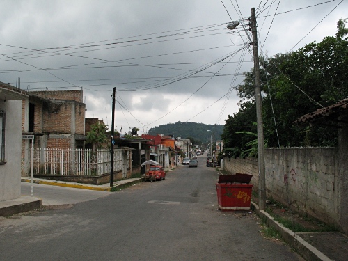 Primo Verdad, Coatepec. In the distance the "snake hill" Coatepec is named after.