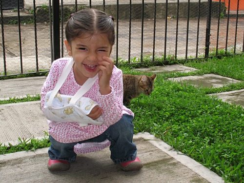 Alice and the cat in our garden, Coatepec.
