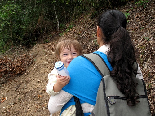 Esme, carrying Adam, following the side track back to the main track.